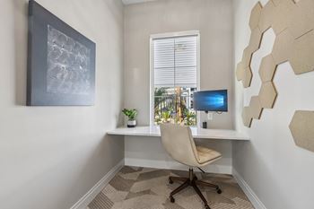 Home office with floating desk and modern chair